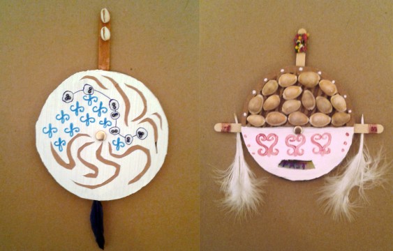 Gourd Follower and Past to Present by Natalie Wood Two unique talismans made from circular cardboard and adorned with shells, decorative marking, beads and feathers